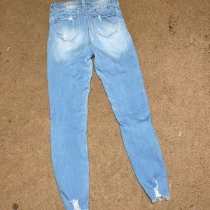 light blue ripped skinny jeans